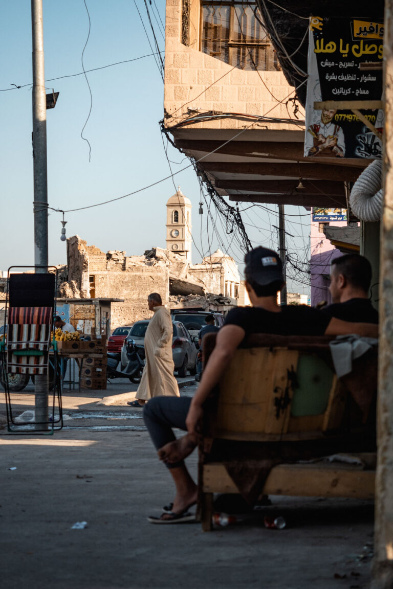 Teen near construction equipment amid Mossul’s rubble and recovery process