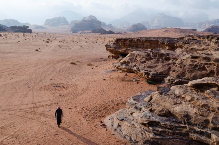 Red sand desert and towering rock formations in Wadi Rum, Jordan