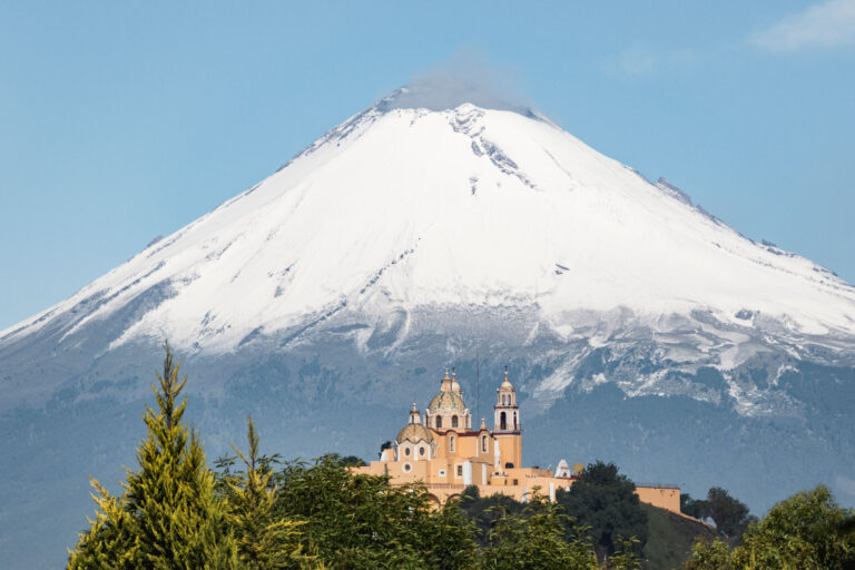 Popocatépetl and Iztaccíhuatl volcanoes rising above the clouds in Mexico