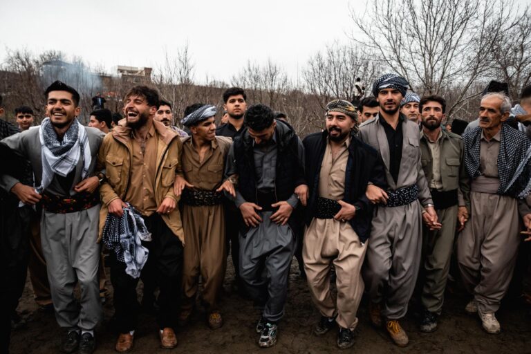Men celebrating the Kurdish New Year (Nowruz) with music and dances in Bewran, Kurdistan.