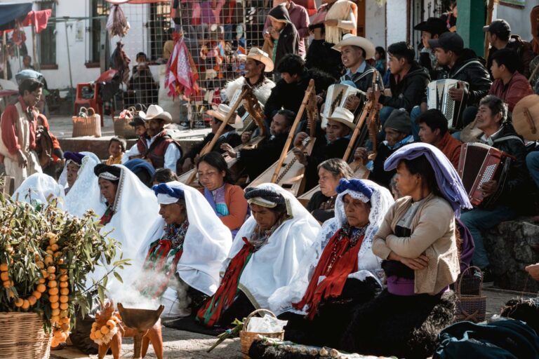 Mexican women in traditional clothing participating in a local event in Chamula.