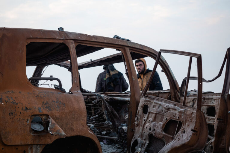 Burned-out and destroyed car, a remnant of conflict in Saraqib, Syria.